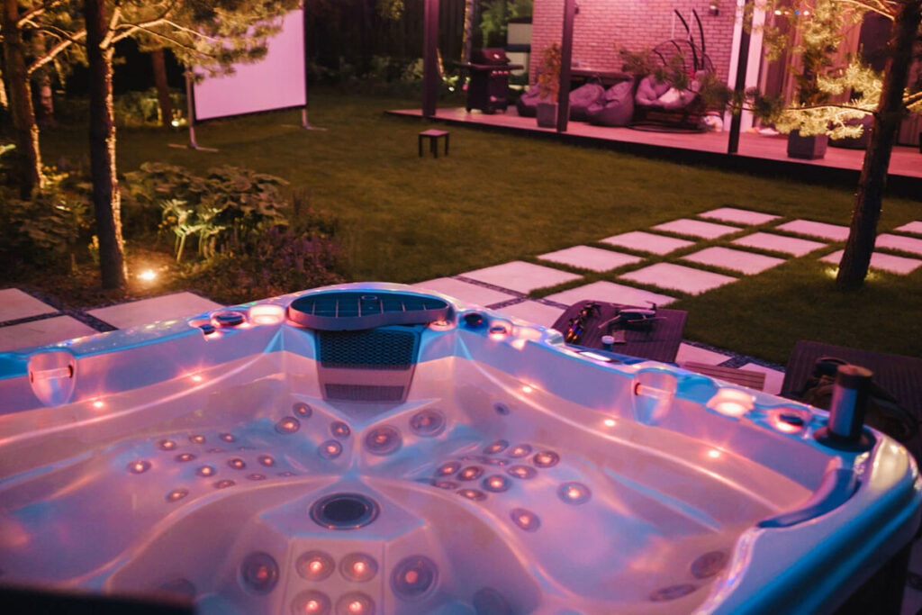 jacuzzi with hot water and evening lighting
