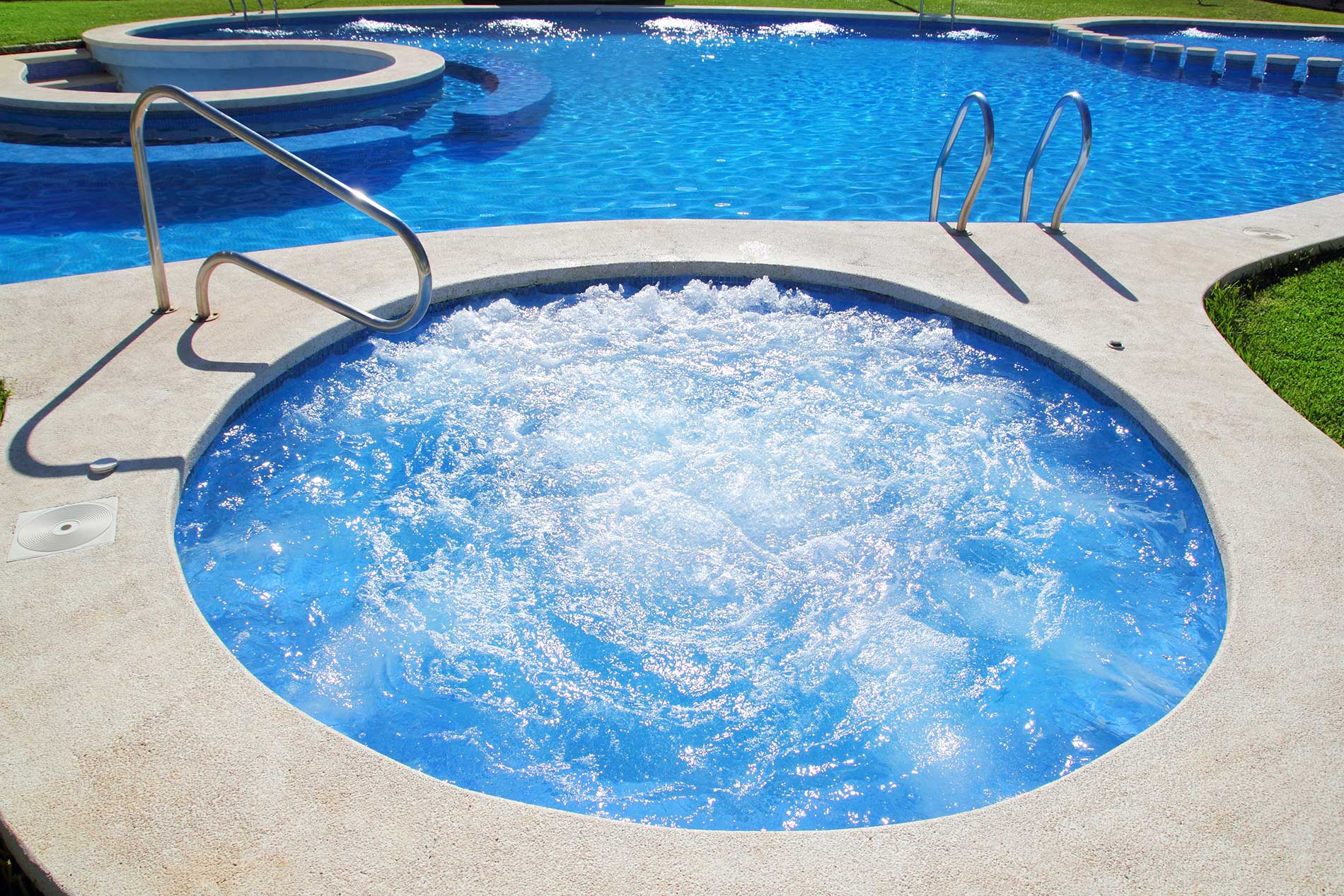 a-view-outside-of-a-pool-and-jet-spa-pool a-view-outside-of-a-pool-and-jet-spa-pool