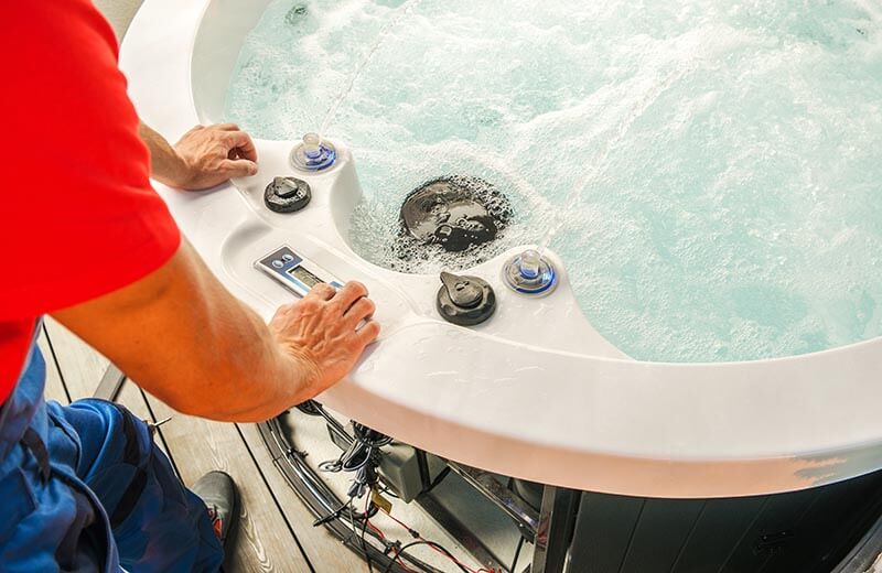 spa technician performing hot tub repair
