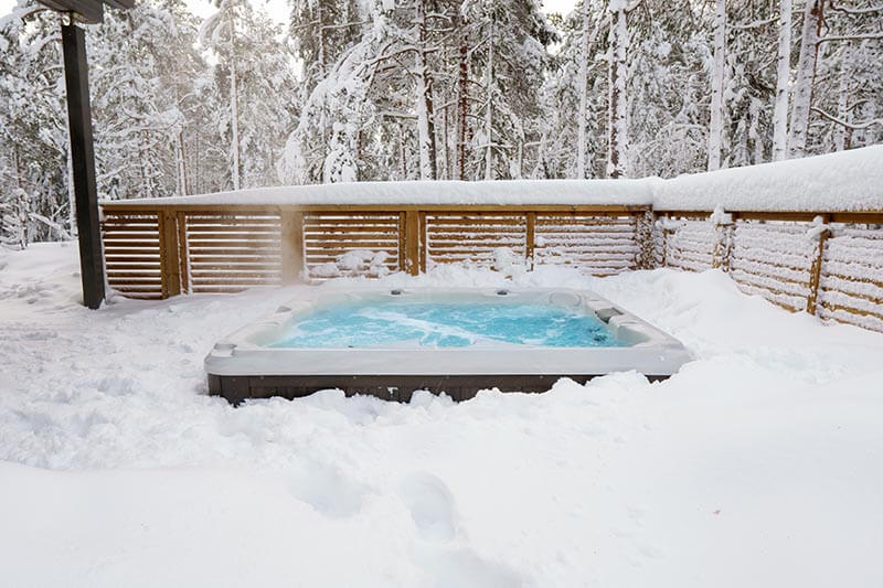 warm-hot-tub-invites-you to relax in the beautiful winter landscape